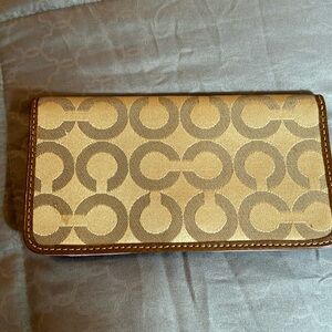 Authentic Coach bi-fold wallet insert. Used in good condition